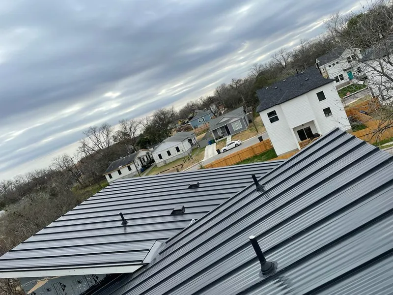 Standing seam metal roof panels with vents for Skylight Repair in Bettendorf